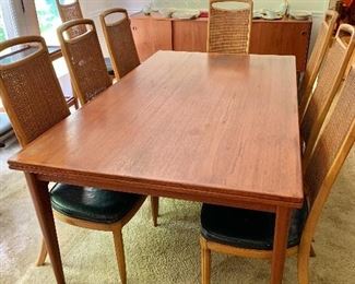 $2400 J.L. Moller Models Denmark  Mid-Century Modern extending dining table.  71" L, 41" W, 28.5" H, plus 2 leaves each 23" W.  Table extends to 94" one leaf, 117" two leaves. 