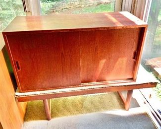 $250 Mid-Century Modern wall unit cabinet with sliding doors.  20.75" H, 39.25" W, 15.75" D