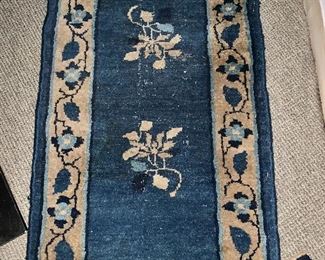 $95 Vintage  blue and cream floral rug 46" L x 26" W. 