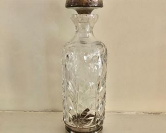 $95 -  Decanter with sterling  base and top  10.5" H by 3.5 " diam