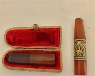 $65 Pair Cigarette holders, smallest in fitted case, largest as-is
3” L (largest)