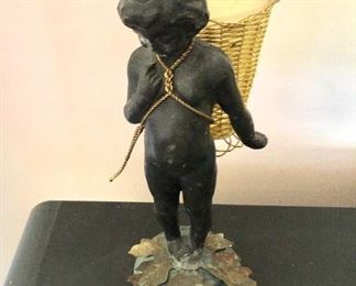 $75  "Petite Choses" Bronze figure holding basket marble base.  7.5" H, 3" W, 3.75" D.  