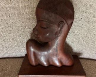 $45 Carved wood statue on stand 
