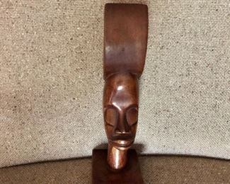 $60 Carved wood face on stand 