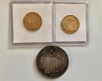   $395 Left  1895 Angel  20 Franc gold coin    $395  Right  1854-A 20 Franc Napolean gold coin Lower $25 10 Franc 1965 silver coin 