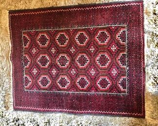 $140 Carpet with medallions.  40" L x 28.5" W.  