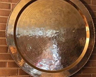 $60 Large brass tray hanging on wall , can be made into table - (Table legs next photo) 