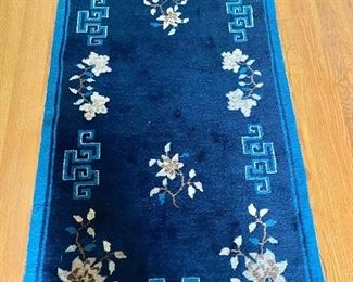 $300 Scatter rug #1.  Approx 70" L x 36" W. 