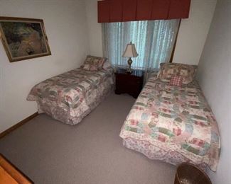 Twin beds with bedding
