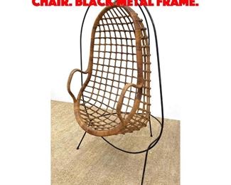 Lot 79 Hanging Woven Rattan Egg Chair. Black Metal Frame. 