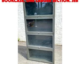 Lot 285 4 Part Metal Stacking Bookcase. One larger section. JEB