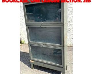 Lot 287 3 Part Metal Stacking Bookcase. One larger section. JEB