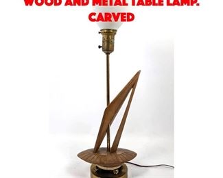 Lot 434 Modernist Mid Century Wood and Metal Table Lamp. Carved