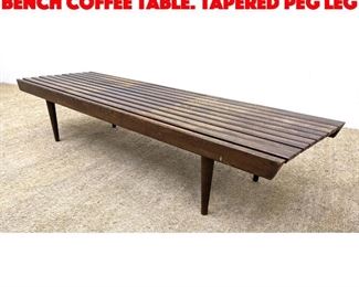Lot 448 Modernist Wood Slat Bench Coffee Table. Tapered peg leg
