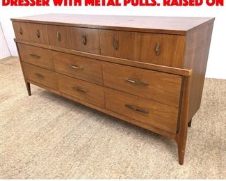 Lot 450 Modernist Credenza Dresser with Metal Pulls. Raised on 