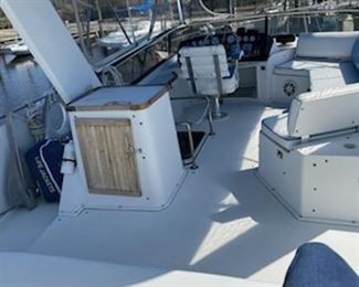 1988 Carver 360 Mariner Flybridge-40' boat, If you are looking for a condo on the water here it is. And sells with 6 months free slip rental, 2 7.4 Mercruiser engines, new interior, new top new full enclosure, full salon with dinette, sofa, kitchen, wet bar, twin bunks, full bath, queen size master, new kohler generator