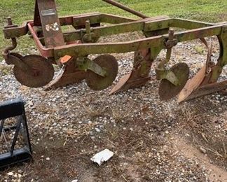 Three bottom breaking plow