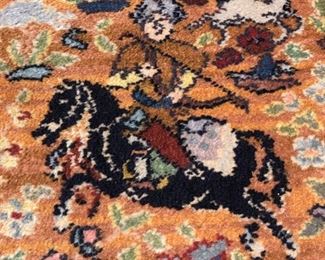 Persian style rug with hunt scene