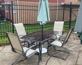 Outdoor table, 4 chairs and umbrella 