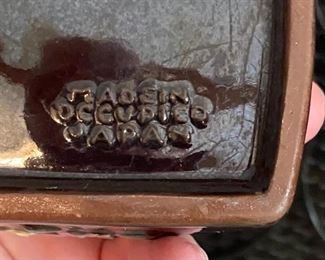 Collectibles labeled “Made in Occupied Japan.”