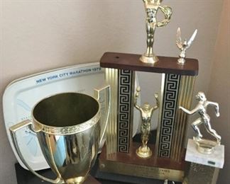 1979 NYC Marathon Trophy and trays and other trophies.