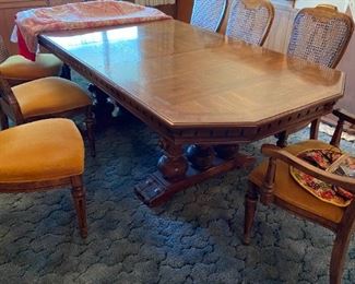 BEAUTIFUL  50+ year old dining room table in pristine condition with additional leaf that will allow ample seating for 10 adults.  Do not miss this one!!!  Chairs are in excellent condition.  All crystal photos are taken on the table top.  