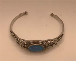 top view-Silver and Turquoise Cuff is 1/2" thick at widest point and measures2 1/2" by 2". the stone measures 3/8' by 5/8"