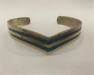 Chevron Cuff 3/8" thick and measures 2.25" by 1.75" $30
