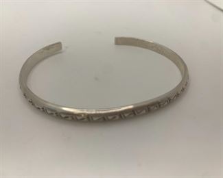 1/8" Thick Silver cuff with subtle etching 23/8" by 2" 