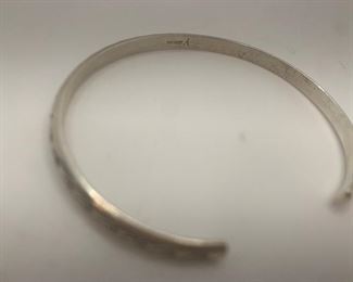 1/8" Thick Silver cuff with subtle etching 23/8" by 2" 