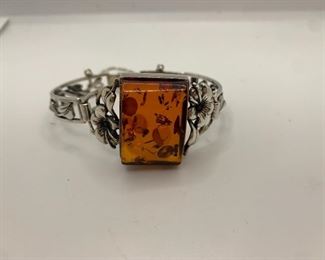 Amber measures 11/8” by 3/4” bracelet is 7” around $125