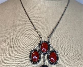 20” necklace with 3” pendant has had  a magnetic clasp added.  No marks $45
