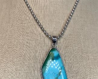 20’ long sterling beads with 3” turquoise stone 
