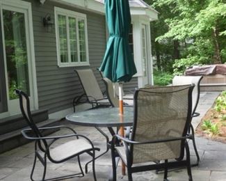 Patio table with 4 chairs by Tropitone.