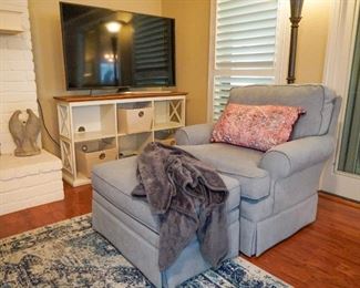 Upholstered chair and ottoman