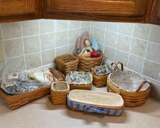 Longaberger Basket Collection of Eight Baskets and Extra Cloth Liners