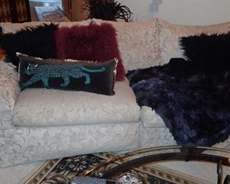 SOFA WITH LOT OF FUN THROWS