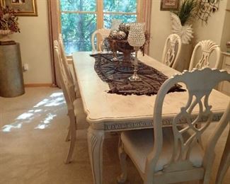 LARGE WHITE TABLE WITH LEAVES AND CHAIRS