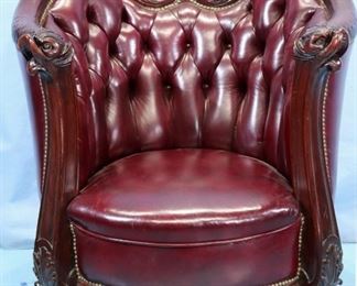 064a - Karpen rounded parlor chair with burgundy upholstery, 41 in. T, 25 in. W, 22 in. D.