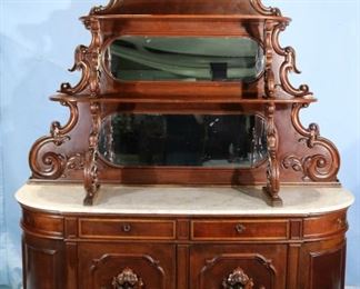 067a - Large walnut Victorian marble top sideboard, has life size deer head with antlers, carved arm support and white marble top, attrib. to Thomas Brooks