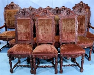 055a - 12 extremely rare walnut Egyptian revival dining chairs attrib. to Alexandra Roux, 55 in. T 25 in. W, 19 in. D.
