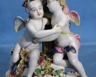 220a - Meissen figurine of 2 cupids embracing, 7.5 in. T, 6 in. W.