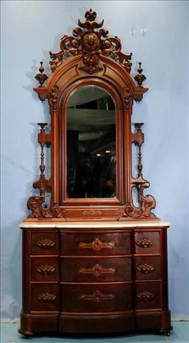  76 - Walnut Victorian marble top dresser with bow front attrib. to Mitchell and Rammelsberg, 9 ft. T, 4 in. W, 23 in D.