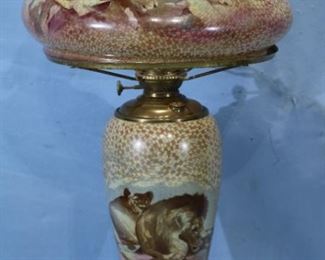  149 - Large glass oil lamp with painted lions on shade and base, still oil made by Pittsburg Mosaic Lamp Co., 29 in. T, shade 17 in. Dia.