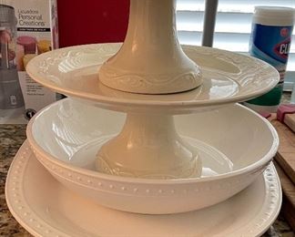 White bowls and cake platters