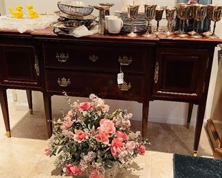 Flower arrangement, plates, silver plated goblets, vintage cabinet