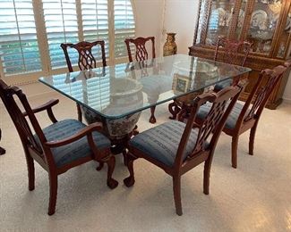 Vintage table and chairs with claw legs.  Base is 2 large hand-painted vases
