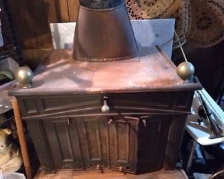 Large cast iron wood burning stove $245.00
