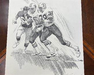 https://www.ebay.com/itm/124776491543	TM9448 New Orleans Saints Print 1981 George Rogrs Makes his move to the Outside 
