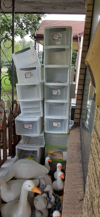 Lots of drawer type containers, storage units